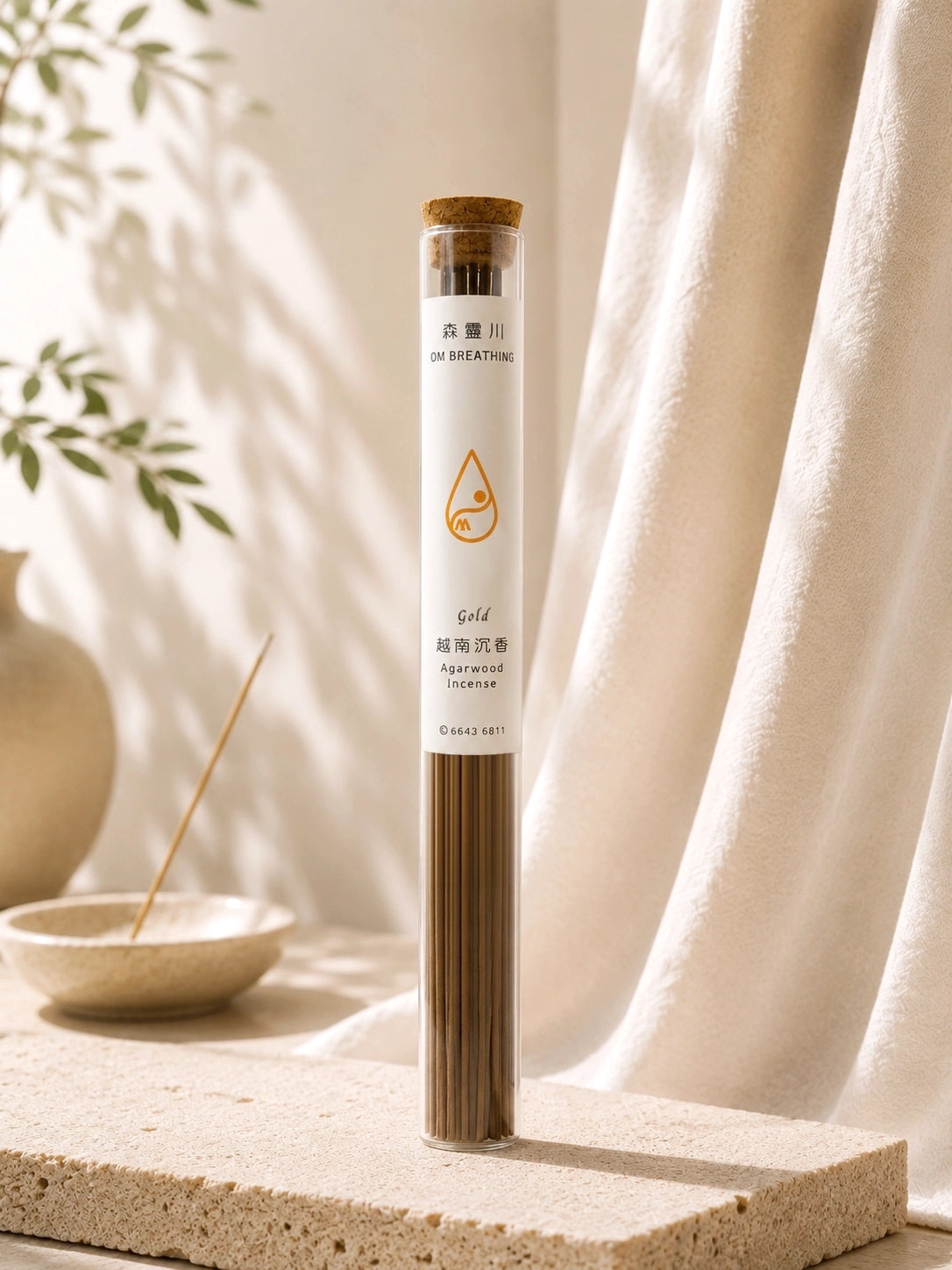 Agarwood incense with 108 sticks, approximately 40-minute burn time, displayed in a clear glass tube on a neutral styled background.