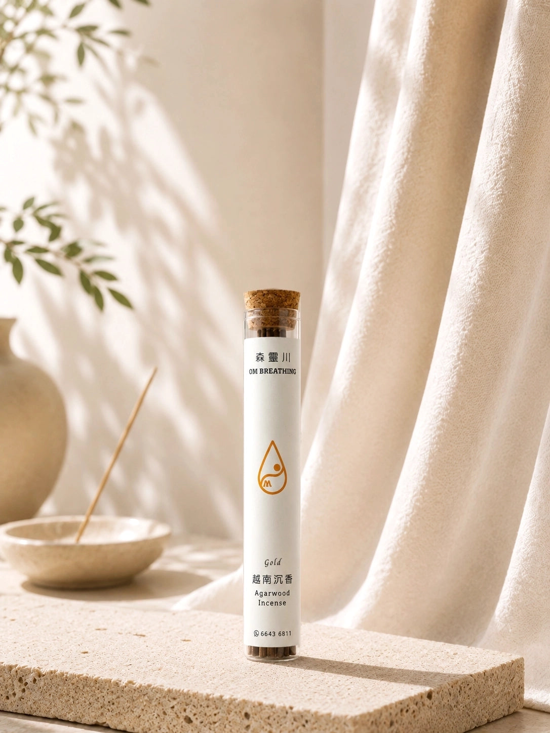 Agarwood incense with 108 sticks, approximately 20-minute burn time, displayed in a clear glass tube on a neutral styled background.