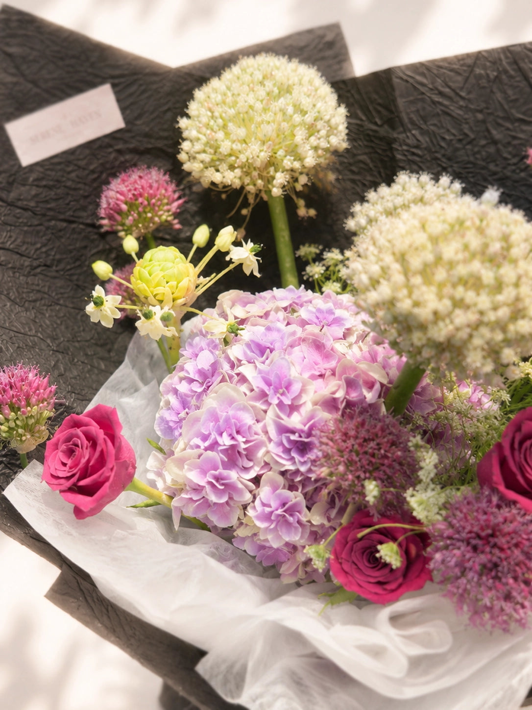 Midnight Reverie bouquet 多角度展示, black wrapping 配紫粉花材, premium bouquet by Serene Haven Floristry