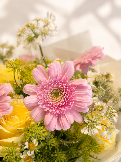 You Mean the World bouquet with pink gerberas, spray roses and soft pastel seasonal flowers 粉紅非洲菊特寫